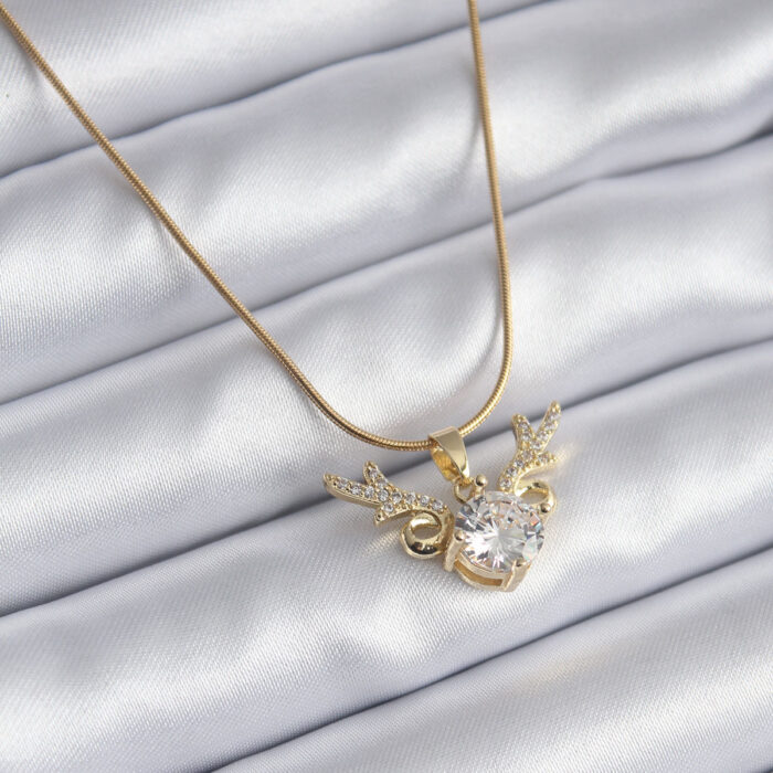 316L Çelik Gold Renk Zirkon Taşlı Boynuz Model Kadın Kolye