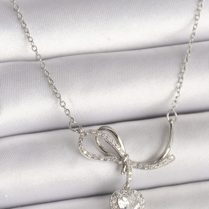 316L Çelik Gümüş Renk Zincir Zirkon Taşlı Düğüm Sallantı Kalp Figür Kadın Kolye