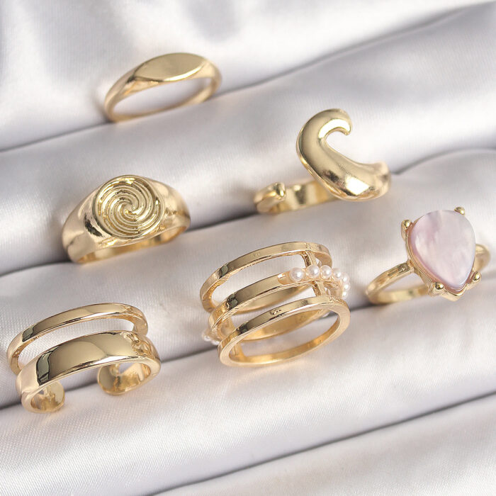 Pirinç Gold Renk Pembe Damla Mineli Sarmal İşleme Detaylı 6'Lı Kadın Yüzük Seti