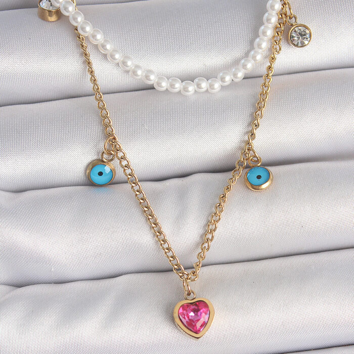 316L Çelik Gold Renk 2'Li İnci Zincir Model Pembe Taşlı Kalp Figür Nazar Boncuk Detay Kadın Kolye