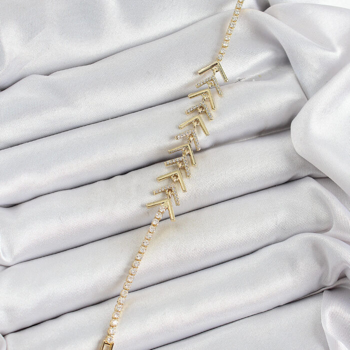 Pirinç Gold Renk Zirkon Taşlı Balık Sırtı Kadın Bileklik