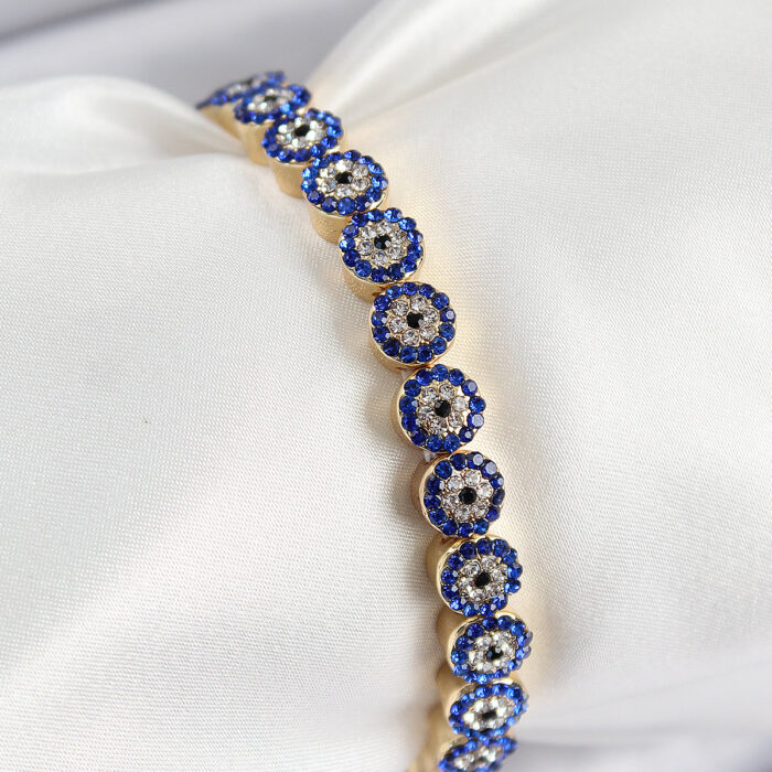 Pirinç Zirkon Taşlı Lacivert Nazar Model Gold Renk Lastikli Kadın Bileklik