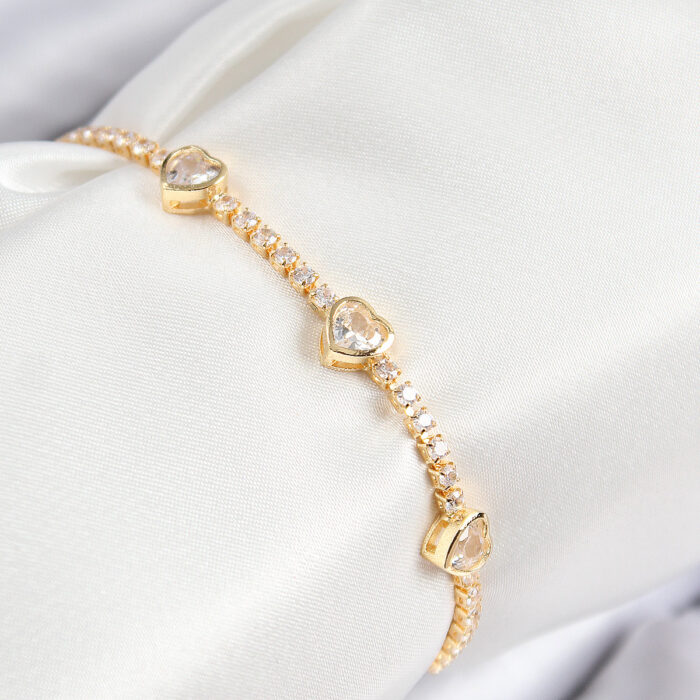 Pirinç Zirkon Taşlı Sıralı Kalp Model Gold Renk Kadın Bileklik